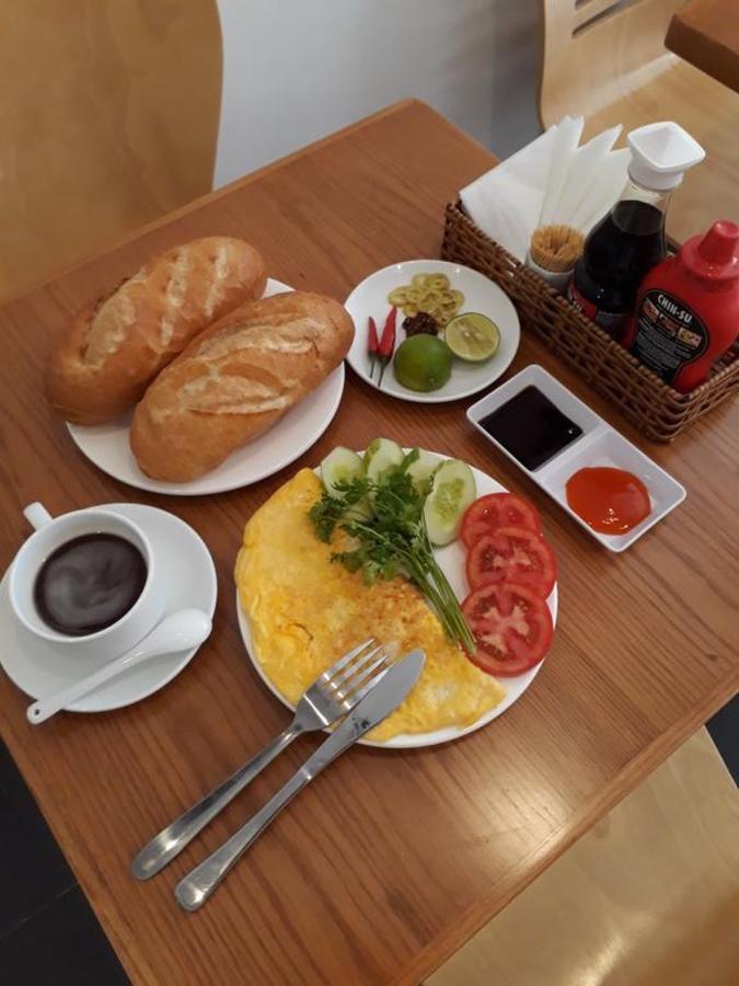 Ha Vy Hotel Ho Chi Minh-stad Buitenkant foto
