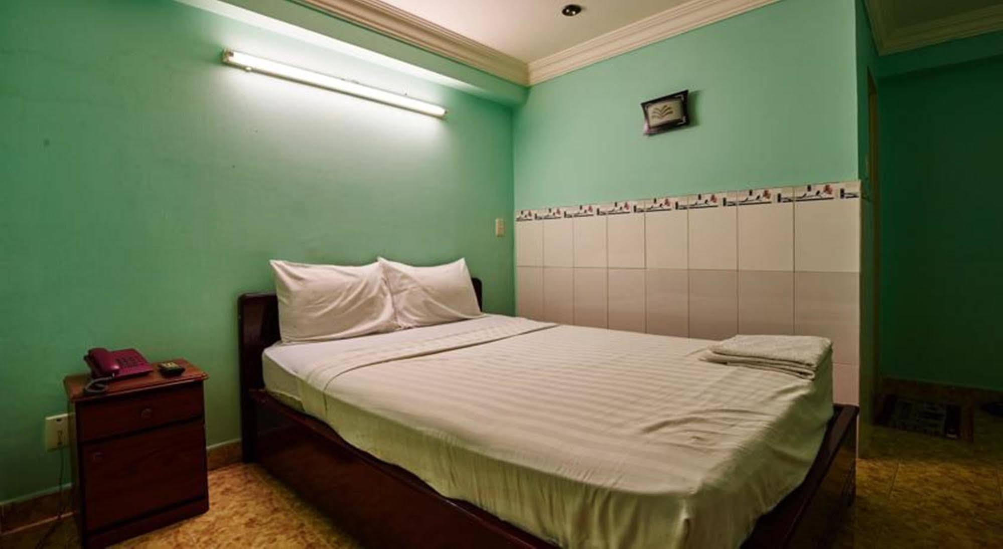Ha Vy Hotel Ho Chi Minh-stad Buitenkant foto