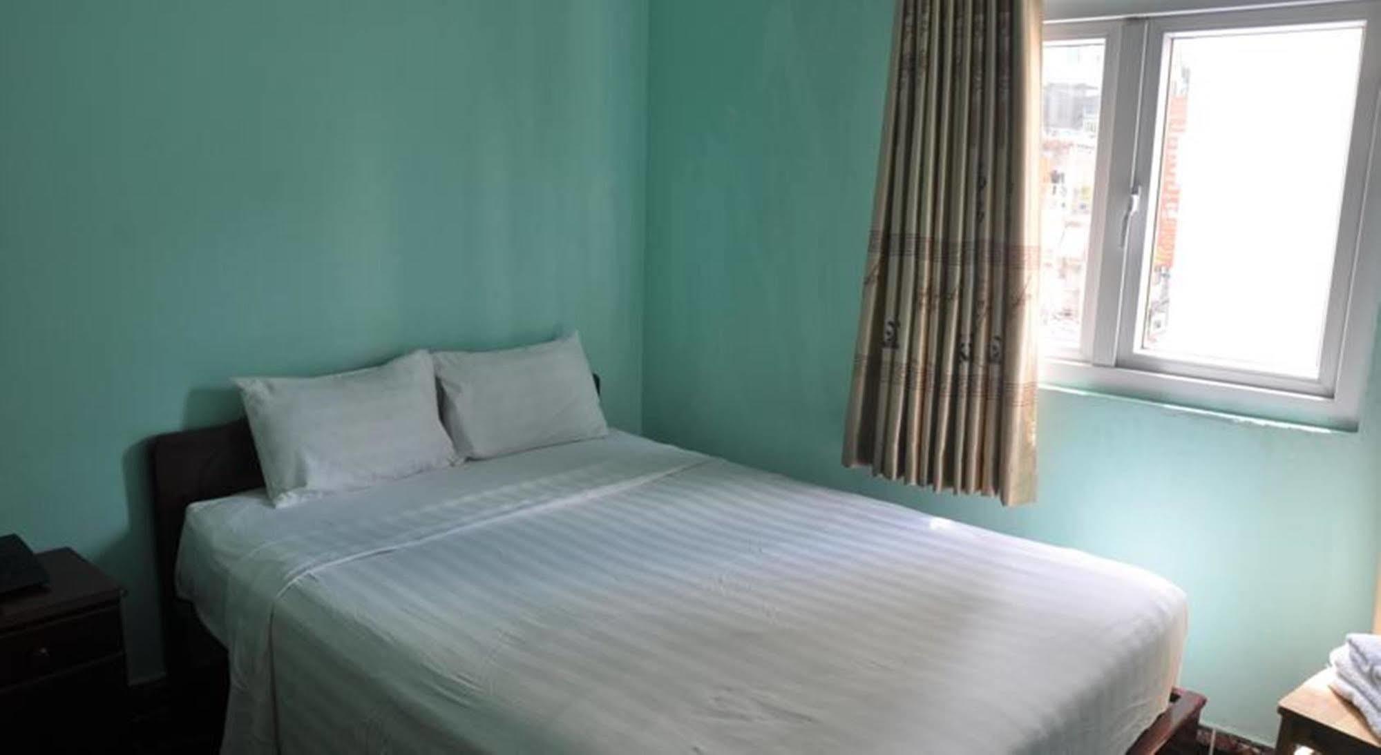 Ha Vy Hotel Ho Chi Minh-stad Buitenkant foto