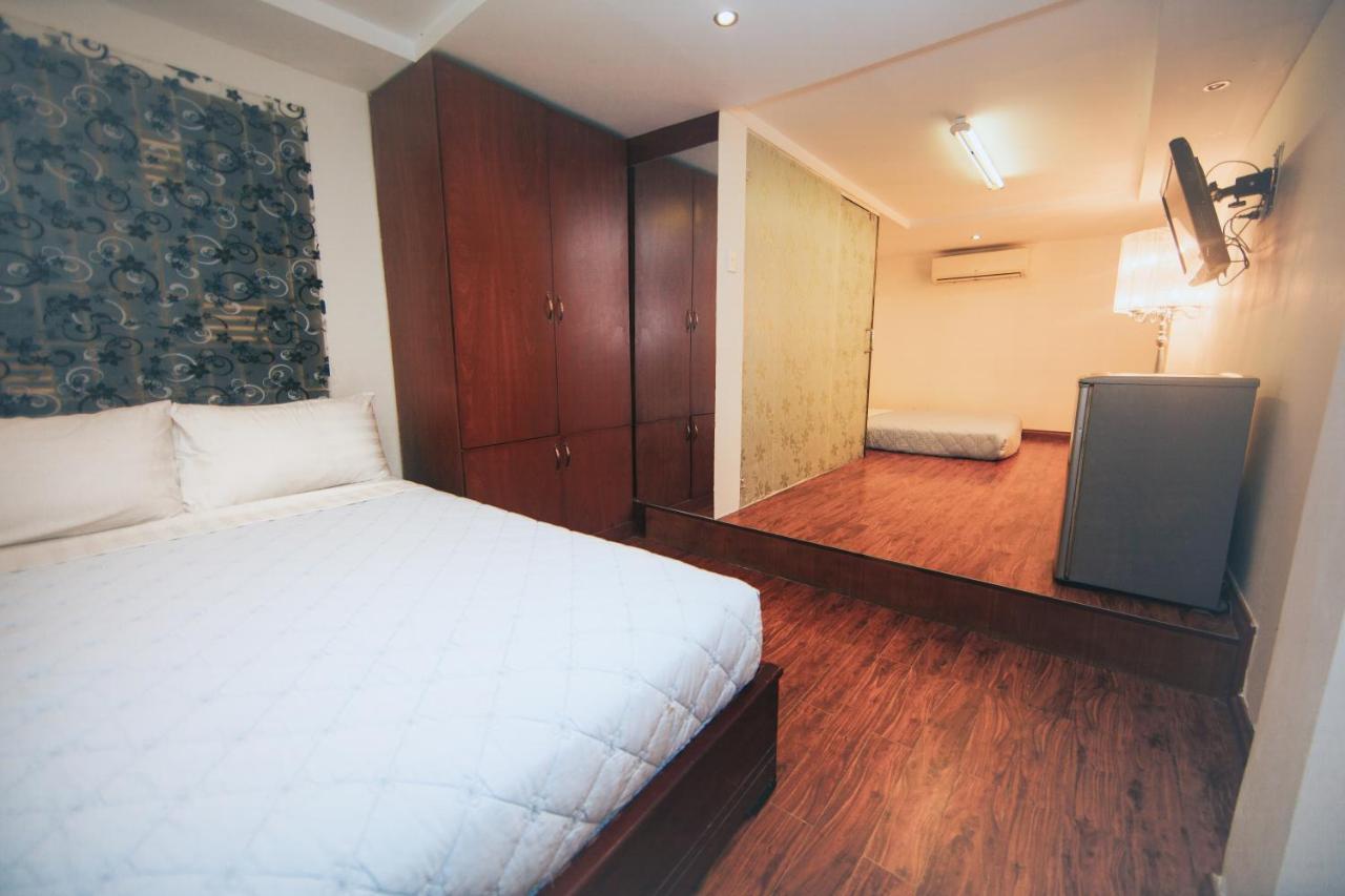 Ha Vy Hotel Ho Chi Minh-stad Buitenkant foto